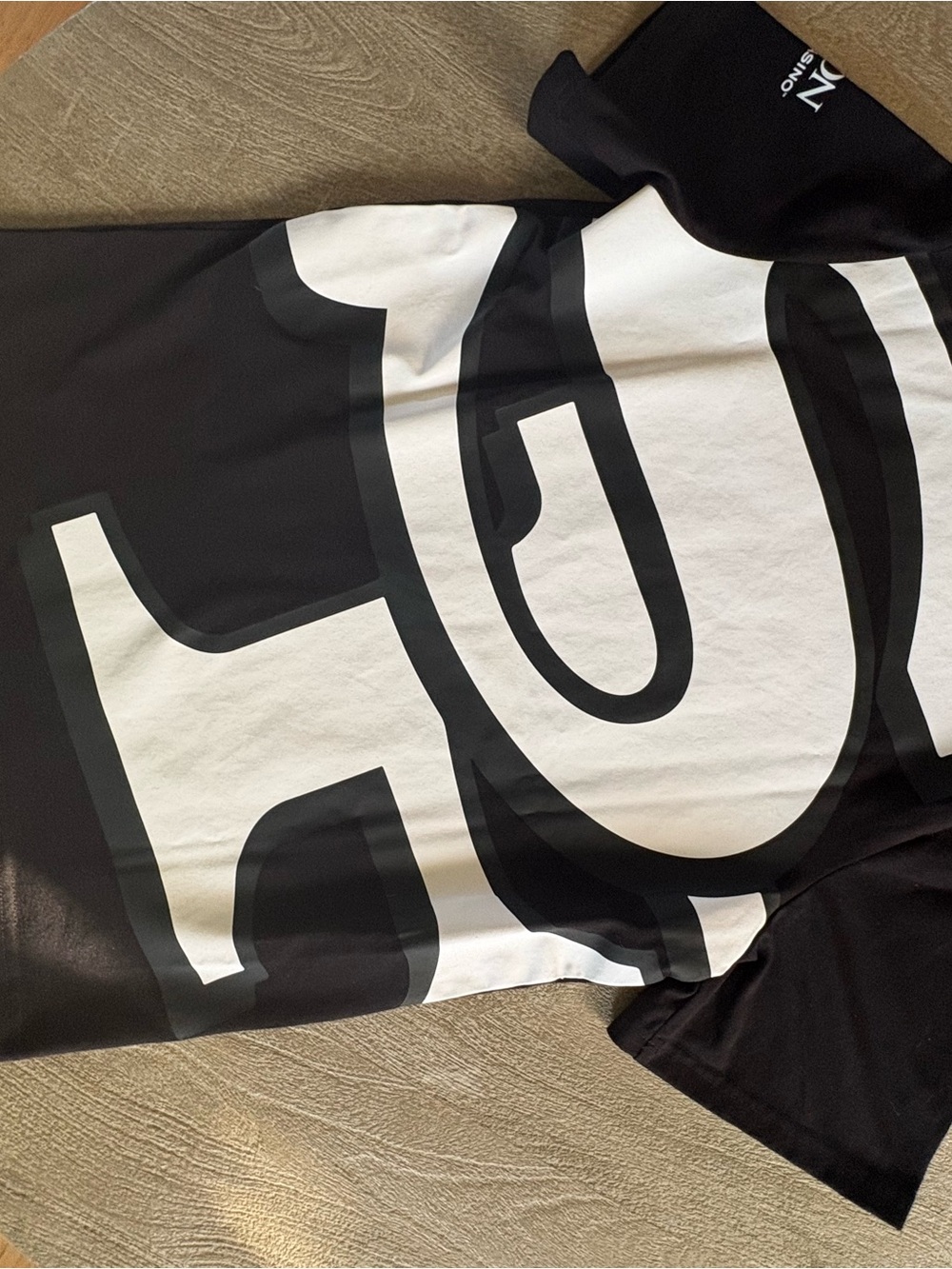 Black Graphic Tee with Small Front Logo